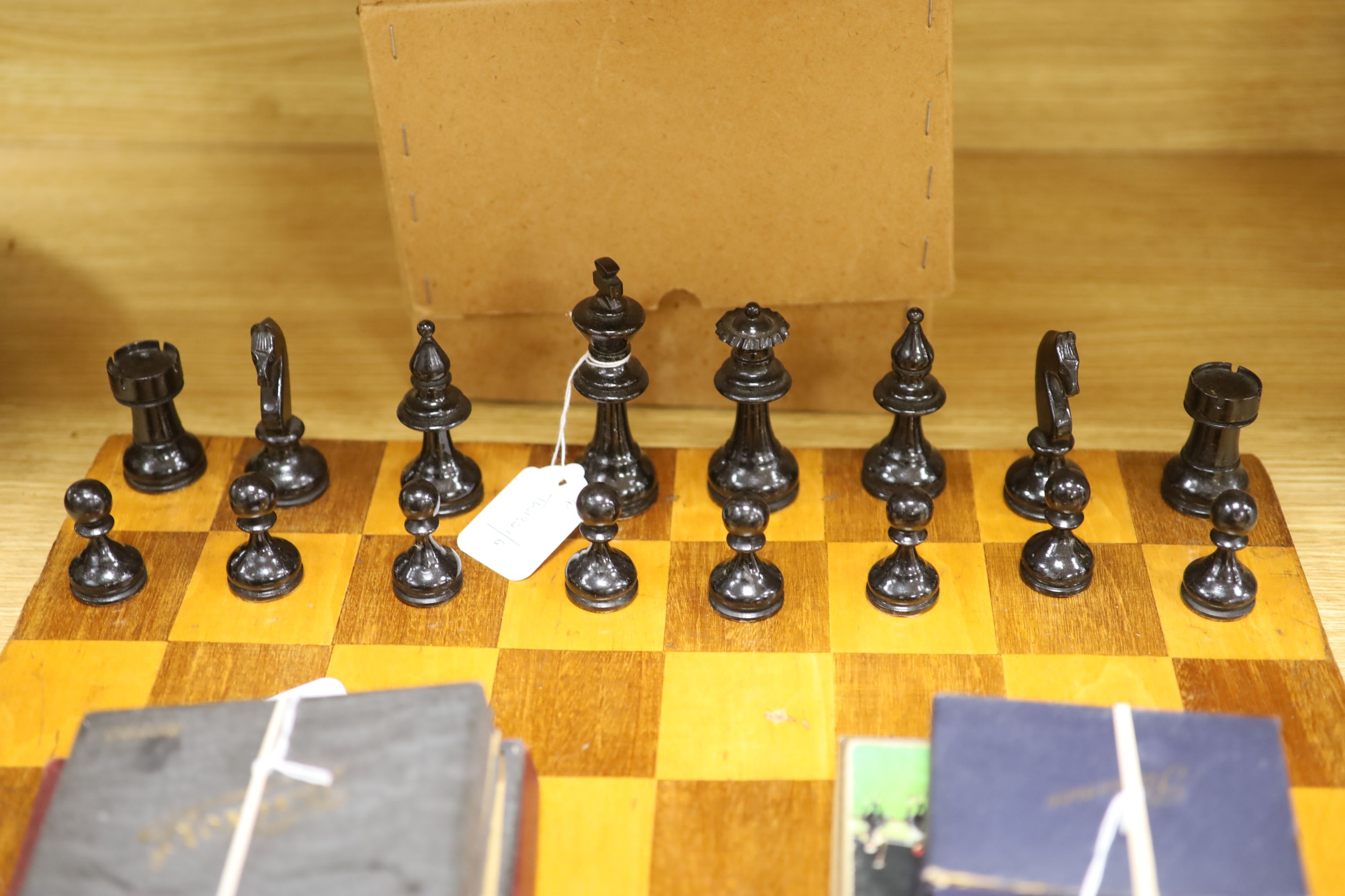 A Staunton style boxwood chess set, a chess board and miscellaneous card games